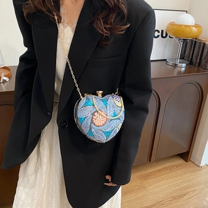 Sequin embroidered heart clutch bag with floral patterns and gold chain for evening events