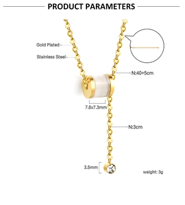 Graphique détaillé des dimensions et matériaux du collier à pendentif cylindre doré