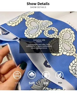Vue détaillée d'une écharpe en soie bleue légère avec motif de nœud de corde et tissu doux