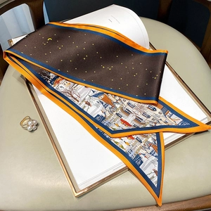 Detailed close-up of a silk scarf with starry sky and village oil painting pattern