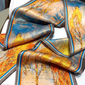 Detailed close-up of artistic oil painting print silk scarf with colorful striped edges