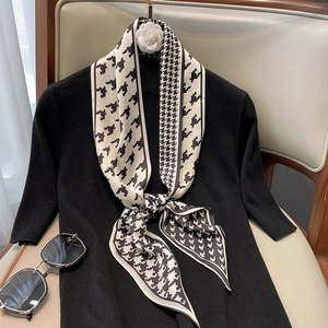Elegant houndstooth print silk neck scarf for women with black and white geometric pattern