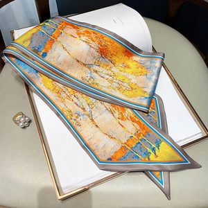Detail of silk-feel scarf with oil painting abstract pattern and orange-blue accents