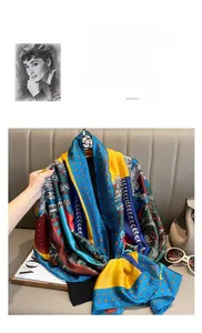 Detail of colorful paisley silk scarf with white camellia buckle and vibrant prints