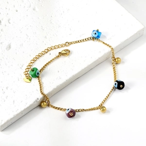 Bohemian gold ankle bracelet with colorful evil eye beads and golden sphere charms