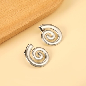 Minimalist spiral silver earrings with polished metal swirl design and stud closure