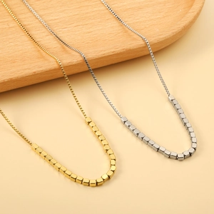 Minimalist stainless steel box chain necklace with cube beads in gold and silver finish