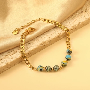 Golden stainless steel Cuban chain bracelet featuring colorful striped natural stone beads
