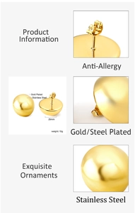 Detail of 25mm gold-plated stainless steel ball earrings with anti-allergy features