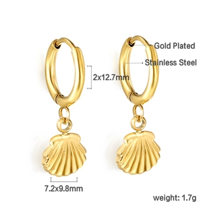Macro detail showing dimensions of gold plated scallop shell earrings with stainless steel hoop