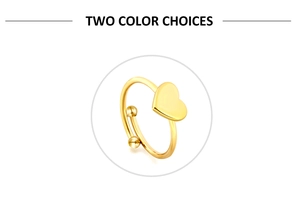 Detail of a minimalist gold heart open ring with polished finish and bead accents