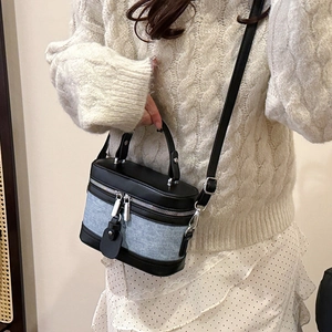 Vintage retro box bag in blue denim and black faux leather with silver hardware