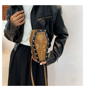 Gothic coffin-shaped crossbody bag with silver studs and gold rose embroidery detail