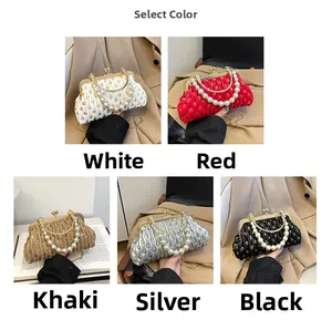 Detail view of sequined pleated bags in five colors with pearl handles and gold clips