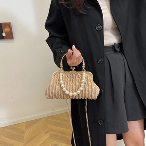 Beige pleated shell clutch bag with pearl handle and sequins for evening wear