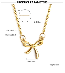 Detailed view of gold plated bow pendant necklace with chain measurements and material info