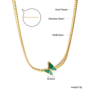 Detail of 18K gold plated stainless steel bow necklace with enamel butterfly pendant
