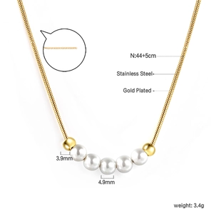 Detail view of gold-plated stainless steel snake chain with five white round pearls