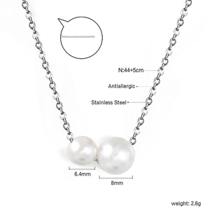 Detail of adjustable chain and clasp on minimalist stainless steel pearl necklace