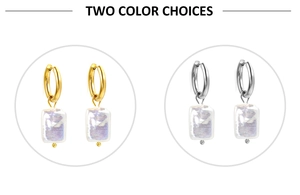 Detail of gold and silver hoop earrings featuring irregular baroque pearl pendants