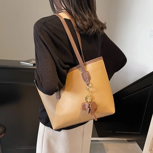 Retro khaki PU leather tote bag with fashion trend print and elephant charm