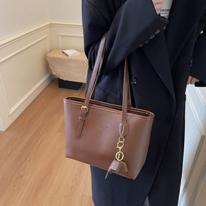 Classic brown PU leather tote bag with long straps and gold hardware for women