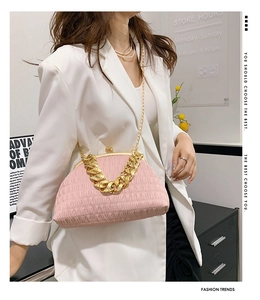 Pink pleated shell bag with chunky gold chain strap and elegant satin finish
