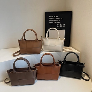 Fashion woven bucket handbags in five colors with top handles and crossbody straps