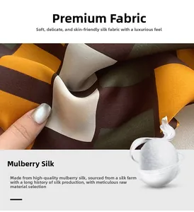 Detail of high-quality mulberry silk fabric with geometric patterns in brown and orange