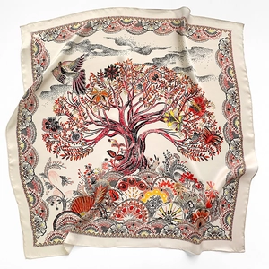 Detail of silk square scarf with beige Tree of Life print and floral patterns