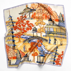 Detailed close-up of premium silk square scarf with colorful Chinese garden print