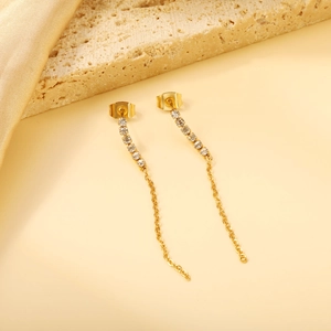Boucles d'oreilles longues à pampilles dorées avec cristaux de zircon blanc de luxe