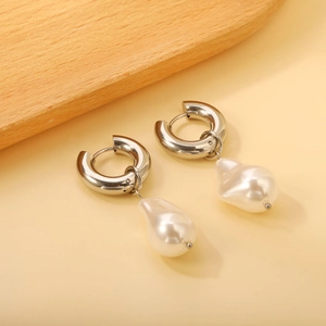 Elegant silver stainless steel hoop earrings with natural irregular baroque white pearls