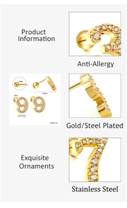 Detailed view of number 7 and 9 gold stainless steel stud earrings with cubic zirconia stones