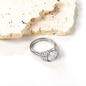 Minimalist silver stainless steel ring with oval white gemstone and textured band