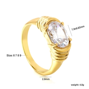 Golden stainless steel ring with large oval zirconia and spiral textured band