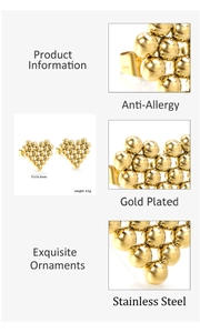Detail of gold-plated stainless steel heart earrings with hypoallergenic properties