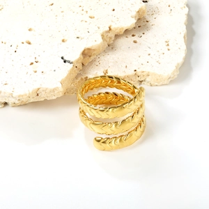 Chic multilayer spiral 18K gold ring with textured weave on elegant stone base