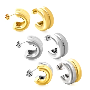 Three pairs of thick geometric C-shaped hoop earrings in gold, silver, and dual-tone finish