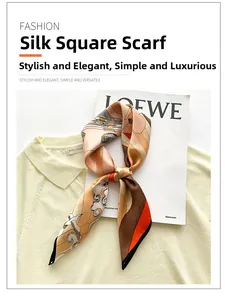 Detailed pattern of a silk square scarf with cranes and traditional architecture