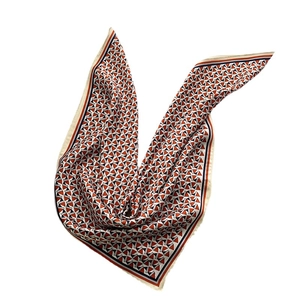 Elegant geometric silk scarf with orange and navy blue triangle patterns on white background