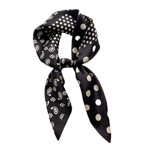 Classic black and white silk scarf with mixed paisley and floral pattern in a knotted style