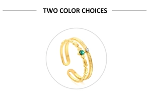 Macro detail of gold-plated double-layer open ring with green stone and white diamond