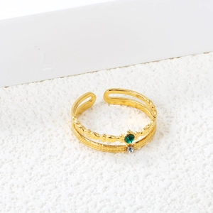 Minimalist double-layered gold stainless steel ring with green gem and white diamond