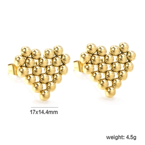 Detailed view of golden heart-shaped stud earrings made of small metal spheres