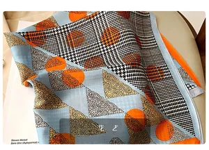 Detail showing high-quality print process and twill texture on a silk square scarf