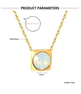 Macro shot of square gold necklace with opal pendant showing dimensions and size detail