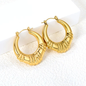 Boucles d'oreilles créoles dorées en acier inoxydable avec design torsadé pour femmes