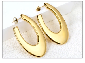 Große goldene U-förmige Ohrringe mit Hochglanzpolitur und minimalistischem, modernem Design