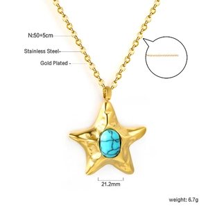 Detail of starfish pendant necklace with natural green stone and golden stainless steel chain